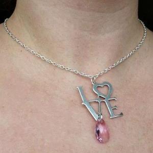 Love. Pink Faceted Crystal, Silver Love Pendant..